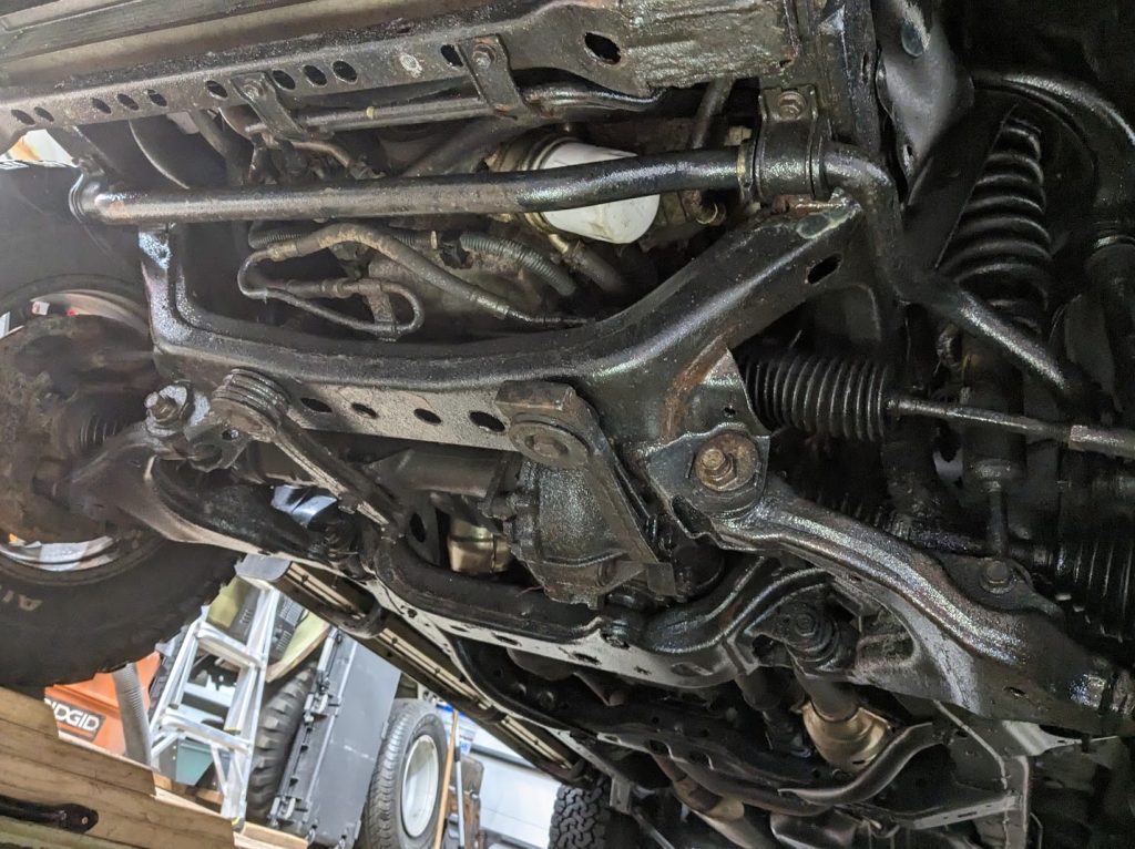 Vehicle underbody and suspension during undercoating