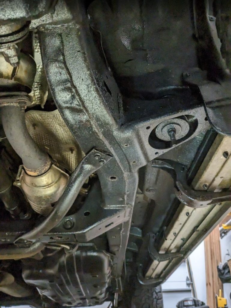 Vehicle underbody and suspension during undercoating