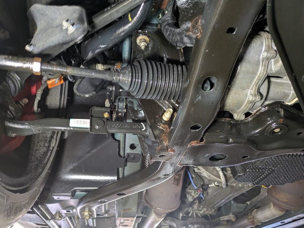 Vehicle underbody and suspension during undercoating