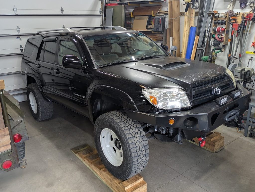 Black Toyota 4Runner in the shop for undercoating