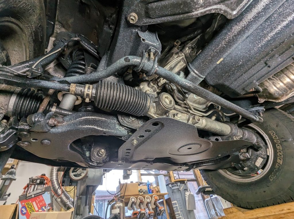 Vehicle underbody and suspension during undercoating