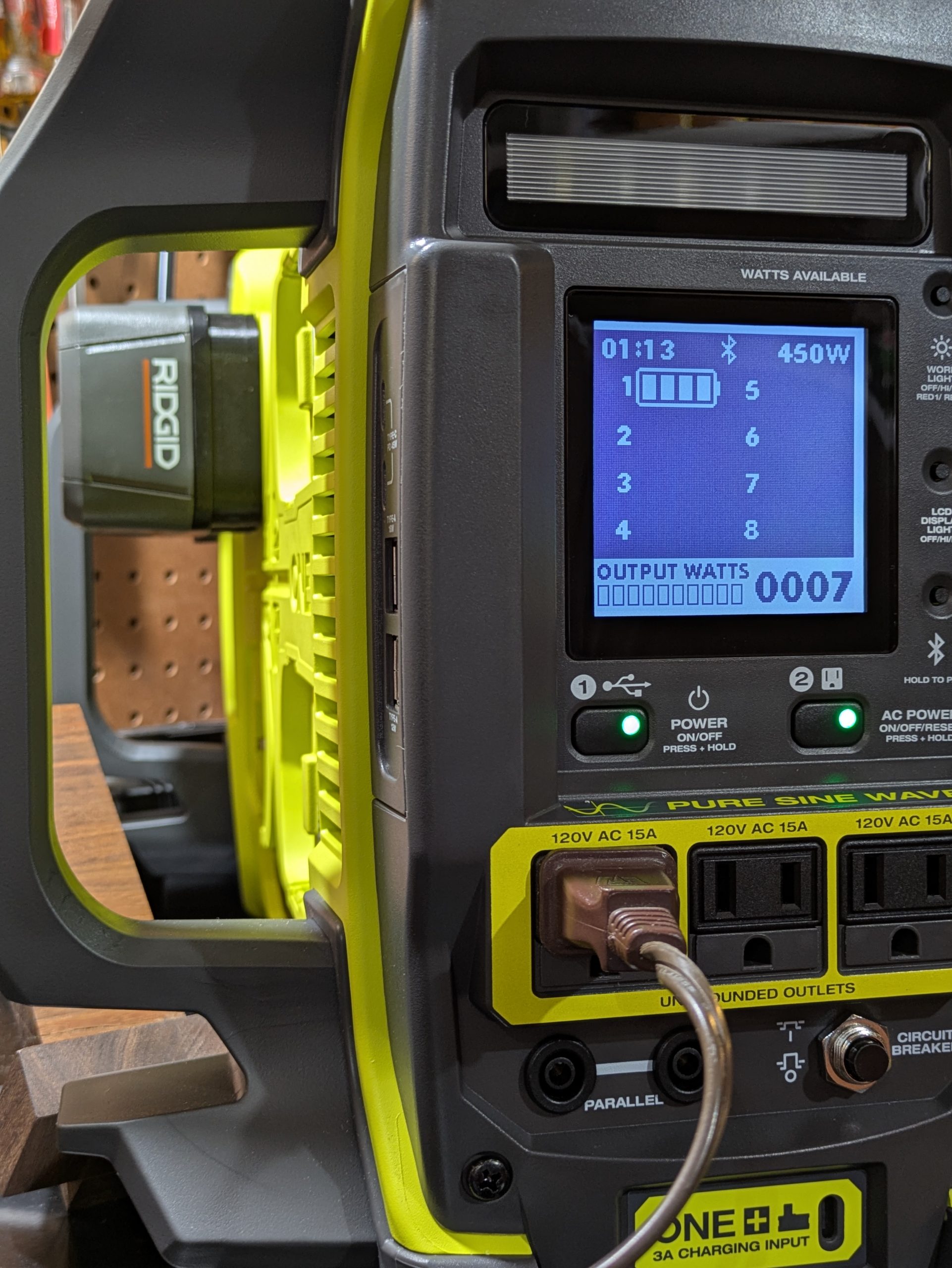 Ryobi power station display reading 450W available with one Ridgid battery loaded through a printed adapter