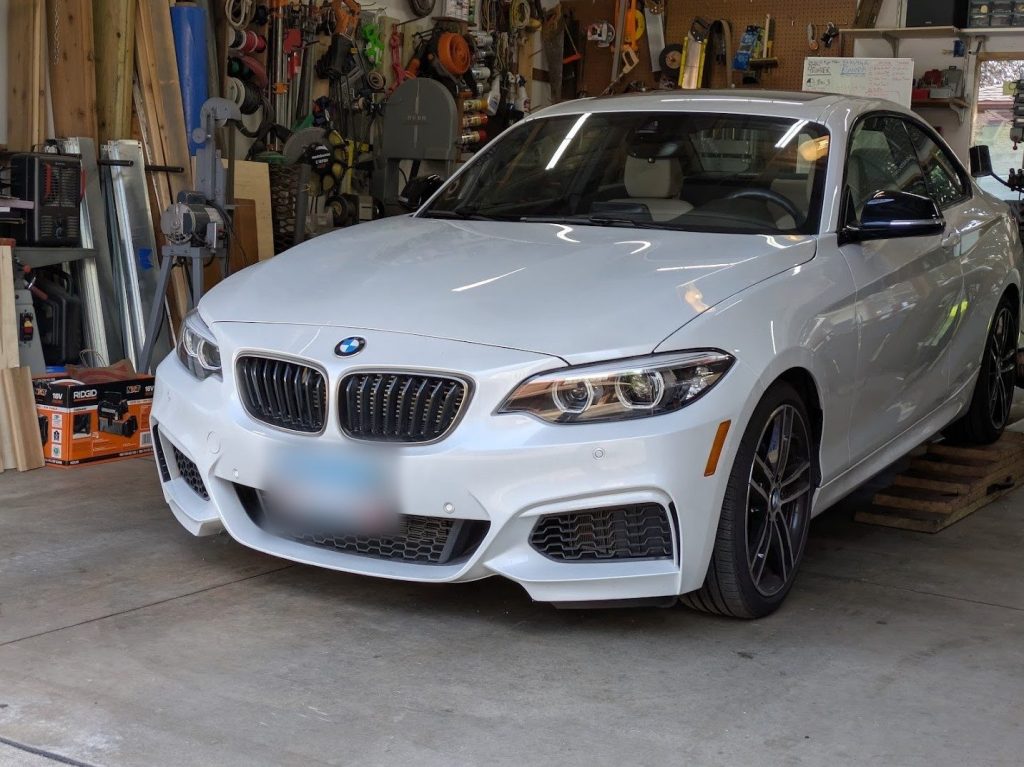 BMW 2 Series coupe in the shop for undercoating