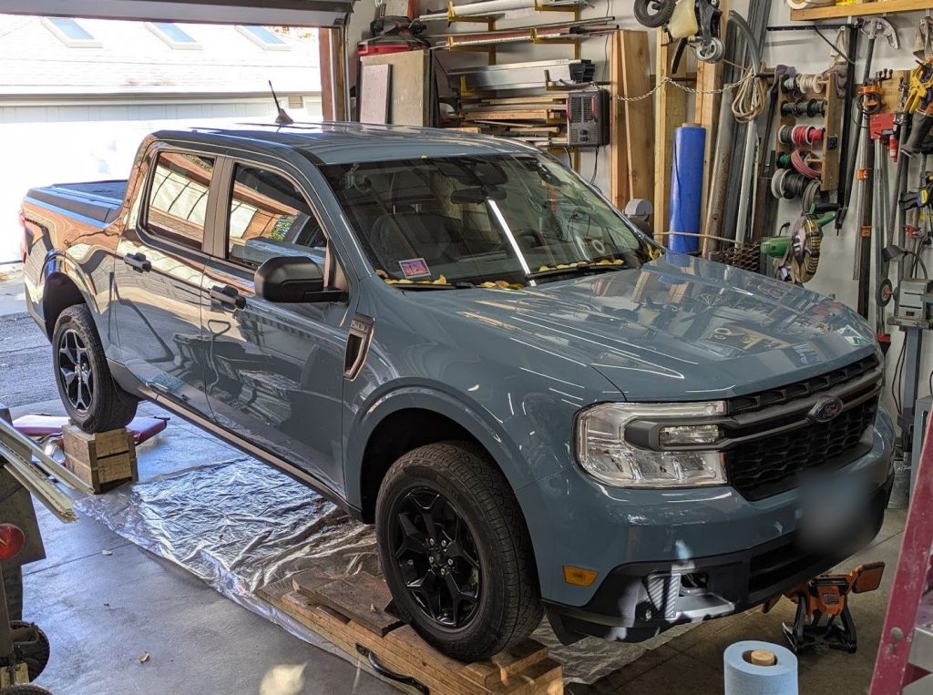 Ford Maverick pickup in the shop for undercoating
